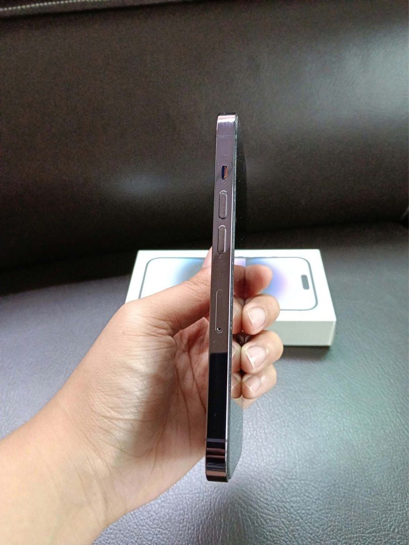 iPhone 14 Pro 128GB, Deep Purple, Dual Physical Sim (Category: iPhone 14 Series) located in Manila. Submitted by waynelenardsy (Listing ID 1469999747, Image 2). Description: iPhone 14 Pro 128GB, Deep Purple, Dual Physical Sim - Fully working, no issues - Bought in HK, 2 slots for physical sim - Battery health: 74% - No scratches, dents, or damage - No repair history - Comes with original box, charger, case - RFS: Upgrading Available for meet up a