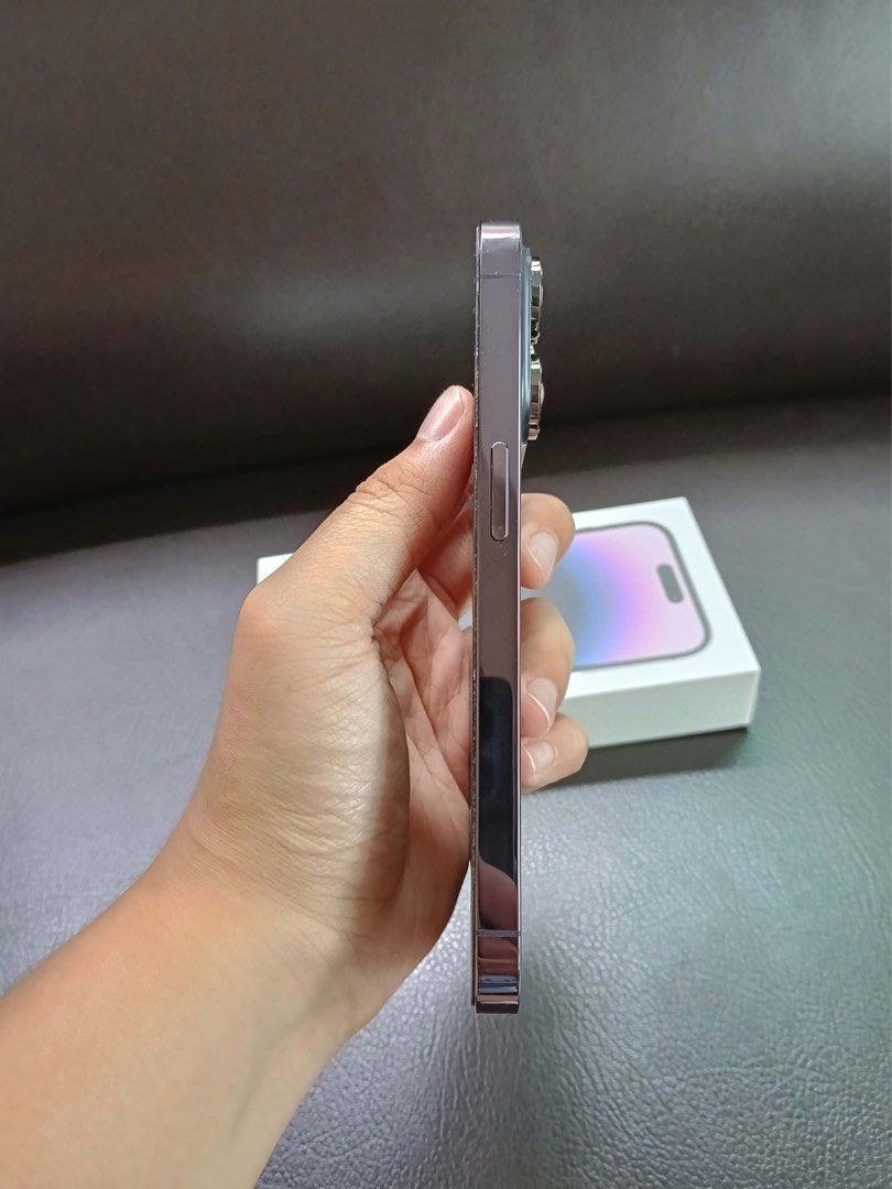 iPhone 14 Pro 128GB, Deep Purple, Dual Physical Sim (Category: iPhone 14 Series) located in Manila. Submitted by waynelenardsy (Listing ID 1469999747, Image 3). Description: iPhone 14 Pro 128GB, Deep Purple, Dual Physical Sim - Fully working, no issues - Bought in HK, 2 slots for physical sim - Battery health: 74% - No scratches, dents, or damage - No repair history - Comes with original box, charger, case - RFS: Upgrading Available for meet up a