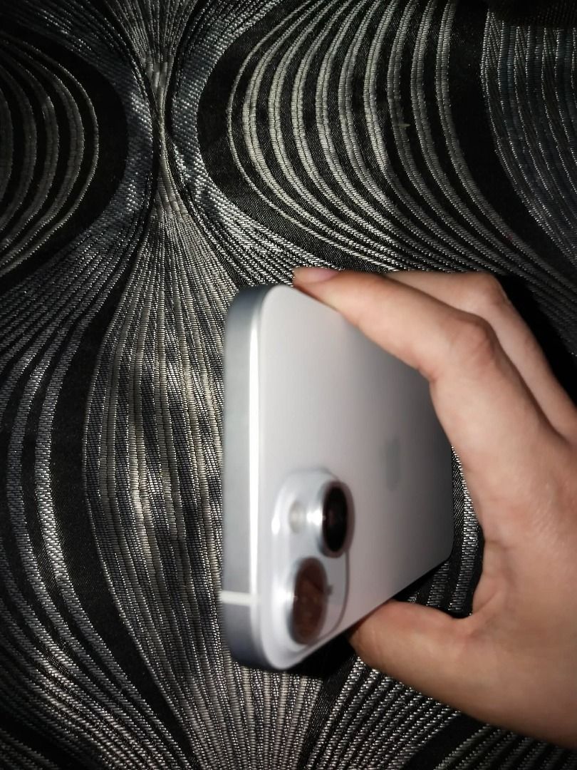 iPhone 15 with box - first owner (Category: iPhone 15 Series) located in Caloocan City. Submitted by judynickcops (Listing ID 1470066234, Image 3). Description: - Brand and Model: Apple iPhone 15 - 256gb - Color: Elegant light purple/lavender finish - Features: Dual rear camera setup, sleek aluminum frame, premium glass back - Ideal for: Daily use, high-quality photography, and modern style.