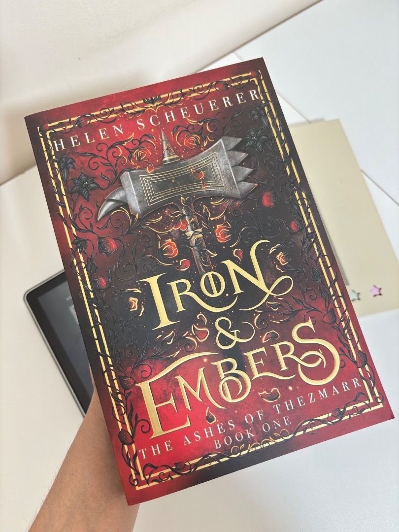 Iron & Embers by Helen Scheurer (Category: Storybooks) located in Imus. Submitted by thebookafterromantasy (Listing ID 1469971623, Image 2). Description: 🌙 THE BOOK AFTER | PRELOVED BOOKS 📖 IRON & EMBERS by Helen Scheuerer Format: Paperback Condition: Like New Reading Status: Unread ✨ Book Condition: Personally owned and well-maintained Never read Cover and spine are to be in excellent overall condition Pages are clean and intact Binding is int