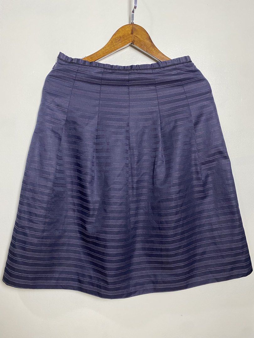 Japan navy stripe A Line skirt (Category: Skirts) located in Makati City. Submitted by indaysukaycloset (Listing ID 1470031616, Image 1). Description: Japan Navy Striped A-line Skirt - 12.5" Waist 21" Length - Small - Office DETAILS: Brand: Japan Brand - Made in Japan Size: Waist 12.5" flat (25" around) - Length 21" - Fits Small / 25-27" waist Japan Tag: Waist 64 / Hip 91 / 64-91 Color: Navy Blue with tonal shadow stripes - elegant old money Mate