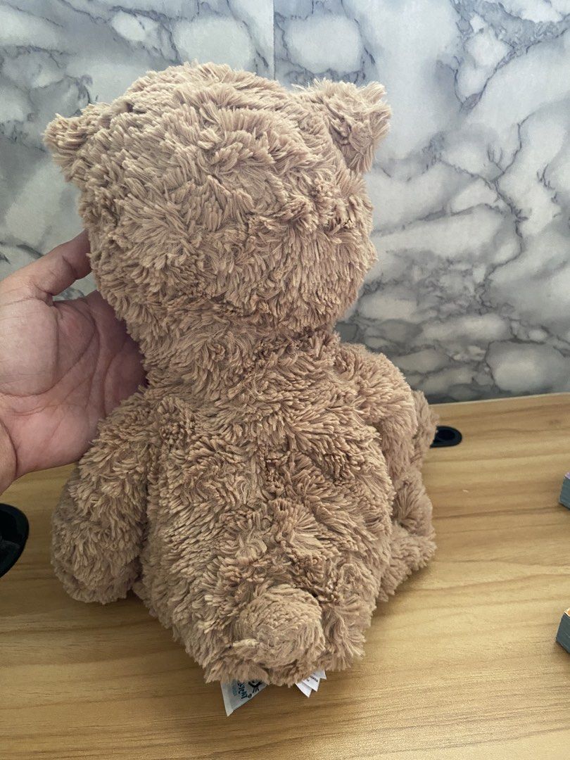 Jellycat London Bumbly Bear (Category: Plushies & Soft Toys) located in Caloocan City. Submitted by izzyjelly (Listing ID 1470001099, Image 2). Description: ❗️NEEDS STUFFING❗️ ✅FREE SHIPPING✅ - Authentic Jellycat London plush bear in light brown - Super soft textured fur with dark stitched eyes and nose - Original cloth tags attached (includes care & safety info, safe from birth) - Clean, flawless condition with no stains or damage - Ideal cuddle