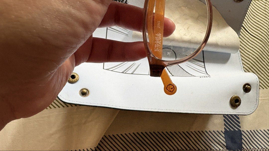 JINS Doraemon Collaboration Glasses Frame (Category: Babies & Kids Fashion) located in Quezon City. Submitted by kemmmee (Listing ID 1469978902, Image 2). Description: - Authentic JINS x Doraemon collection eyewear - Stylish brown and orange lightweight plastic frames - Fun character details printed on the inner temple arms - Adorable bell icon accent at the temple tips - Comes complete with a themed round glasses cloth - Includes a convenient fo