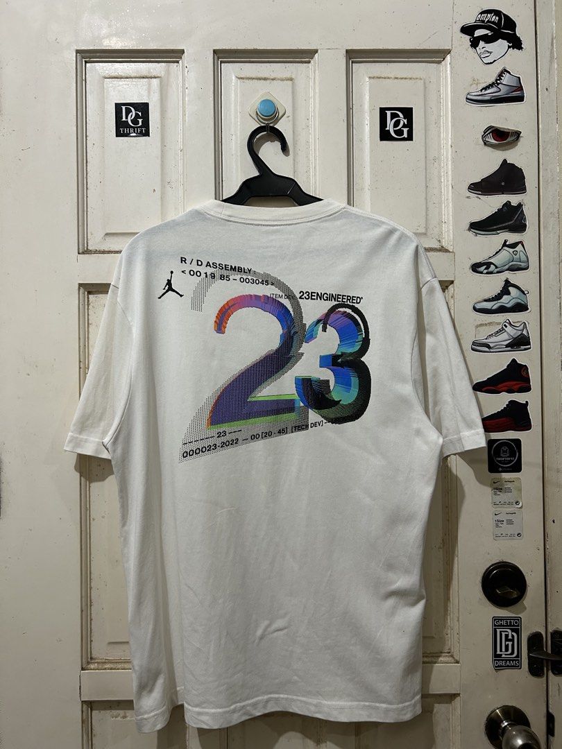 Jordan 23 Engineered Graphic T-Shirt White (Category: Tshirts & Polo Shirts ) located in Pasay City. Submitted by deguzmanjay (Listing ID 1470070181, Image 2). Description: - Brand: Jordan 23 Engineered - Color: White - Size: Small - Fit: Regular fit, crew neck, short sleeves - Design: Small technical branding on chest pocket, large colourful 3D glitch graphic with Jumpman logo on the back - Condition: Clean fabric all around.