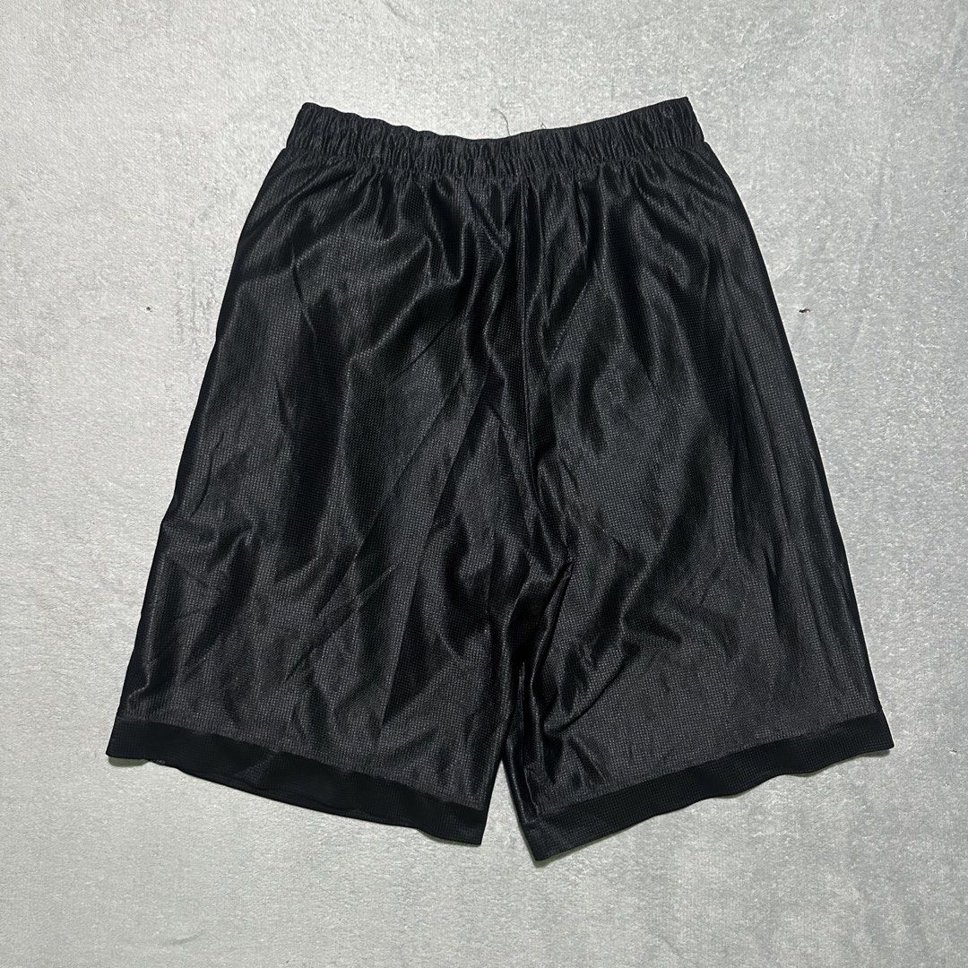 Jordan Black Athletic Shorts (Category: Shorts) located in Bayombong. Submitted by rochelle_archive_garments (Listing ID 1470040382, Image 3). Description: - Color: Classic Black - Size: Medium (Made in Thailand) - Material: Lightweight, breathable textured mesh - Waistband: Elastic with adjustable white drawstring - Branding: White Jumpman logo on left leg & small grey Jumpman tag near right hem - Condition: Clean interior tags, well-maintained 