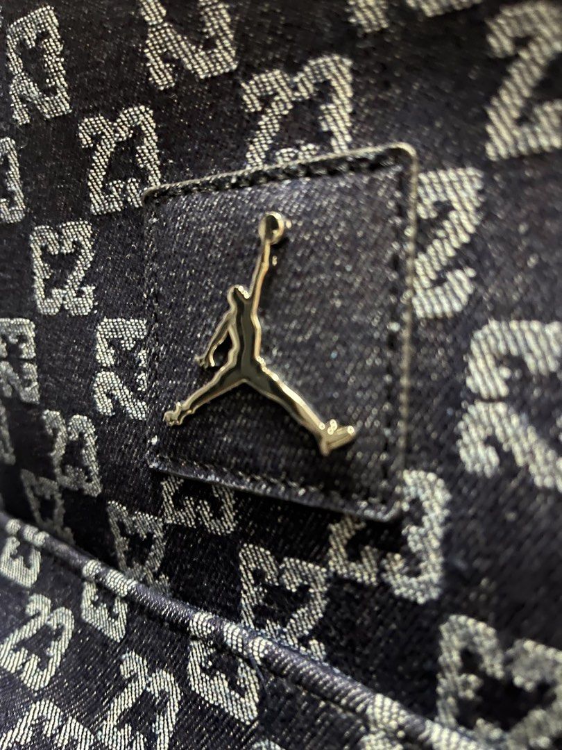 Jordan Denim Monogram 23 Duffle and Backpack Set (Category: Backpacks) located in Manila. Submitted by andengdeng_cat (Listing ID 1470049110, Image 2). Description: - Brand new with tags attached (BNWT) - Matching duffle bag and backpack set in a stylish dark denim wash - All-over '23' monogram print with red embroidered Wings logo patches - Premium metal Jumpman logo plaques on both pieces - Includes a trendy silver mini shoe keychain on the duf
