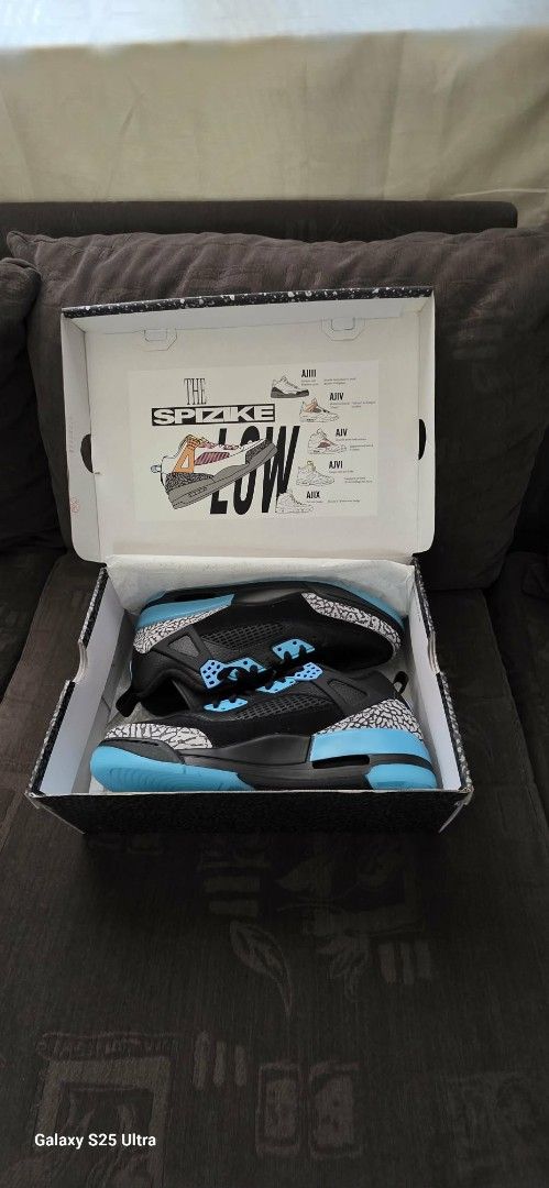 Jordan Spizike Low Black Wolf Grey Gamma Blue (Category: Sneakers) located in Manila. Submitted by backdraft26 (Listing ID 1470065512, Image 2). Description: - Model: Jordan Spizike Low (Black / Wolf Grey / Gamma Blue) - Size: Men's US 10 / Women's US 11.5 - Condition: Brand New / Deadstock with Original Box - Design: Black tumbled leather upper with iconic elephant print overlays - Details: Vibrant gamma blue accents on the lace locks, eyelets, 