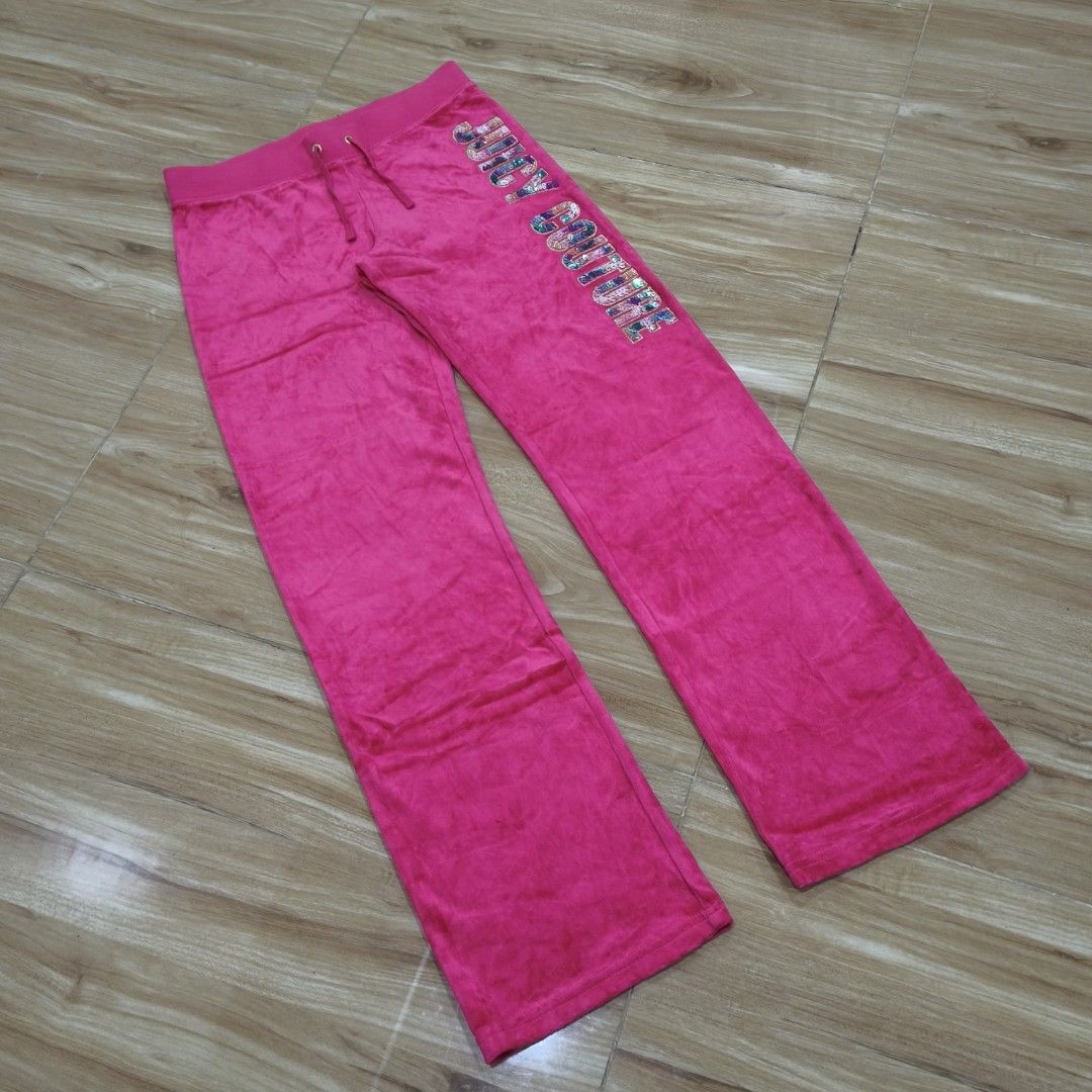 Juicy Couture Black Label Flared Pink Velour (Category: Other Bottoms) located in Cebu City. Submitted by greedthrift.00 (Listing ID 1470133936, Image 2). Description: - Brand: Juicy Couture Black Label - Color: Hot pink - Size: 14 - Material: Super soft velour fabric - Details: Drawstring waist with gold-tone hardware, colorful sequin logo on the left leg - Origin: Made in Vietnam - Style: Y2K casual vibe, comfortable fit.