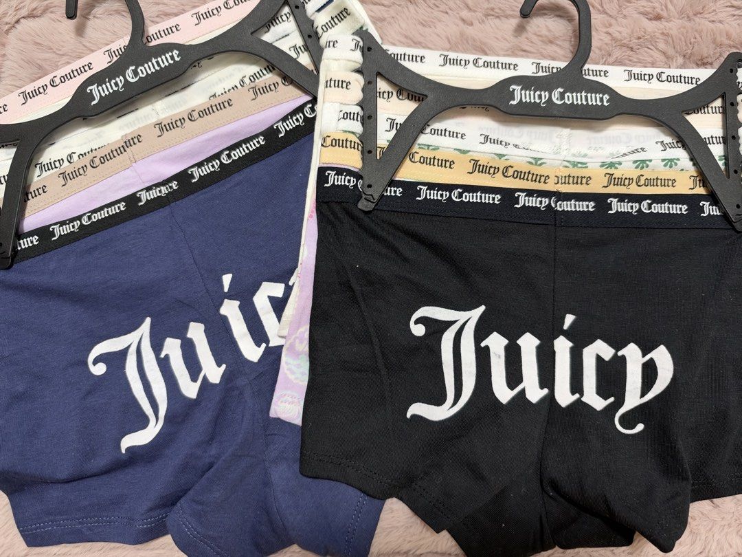 Juicy Couture Multipack Boxer Briefs Underwear (Category: Undergarments & Loungewear) located in Manila. Submitted by danatayag27 (Listing ID 1470086835, Image 1). Description: - Authentic Juicy Couture boxer briefs multi-pack on black hangers - Includes a mix of stylish solid colors and patterns - Thick elastic waistband with repeating Juicy Couture branding - Bold signature Juicy logo printed on the back leg - Crafted from ultra-soft, breathabl