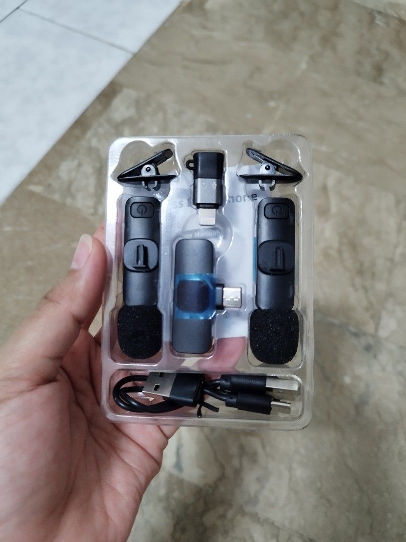 K9 Pro Dual Wireless Lavalier (Category: Microphones) located in Mandaluyong City. Submitted by mjing.1917 (Listing ID 1470026210, Image 2). Description: Condition: 10/10 (Brand New / Open Box Condition - pristine inside) ✨ What's Included inside the complete package: - 2x Clip-on Wireless Microphone Transmitters - 1x USB Type-C Wireless Receiver (Plugs into Android/newer iPhones) - 1x Lightning Adapter (For older iPhones/iPads) - 2x Charging Cab