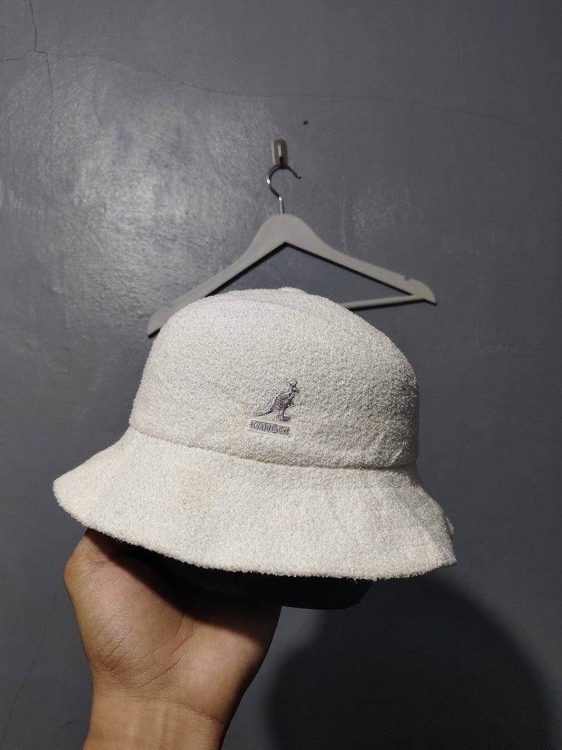 Kangol Bermuda Casual Bucket Hat White Size M (Category: Hats & Beanies) located in Daet. Submitted by eezekethrift (Listing ID 1470070335, Image 1). Description: - Brand: Kangol Bermuda Casual bucket hat - Color: White - Size: Medium (M) - Material: 55% acrylic, 25% polyester, 20% nylon - Texture: Classic towel-like terry finish - Branding: Embroidered kangaroo logo on front with interior Union Jack label - Condition: Brand new with tags.
