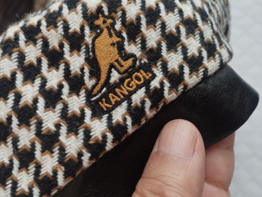 Kangol Beret Large / X-Large (Category: Hats & Beanies) located in Baguio. Submitted by katgon2016 (Listing ID 1470086525, Image 1). Description: - Brand: Kangol - Design: Black and white pattern with a solid black brim - Logo: Signature embroidered kangaroo on the side - Size: Large / X-Large - Origin: Made in China, Born British (Est. 1938) - new without tags.