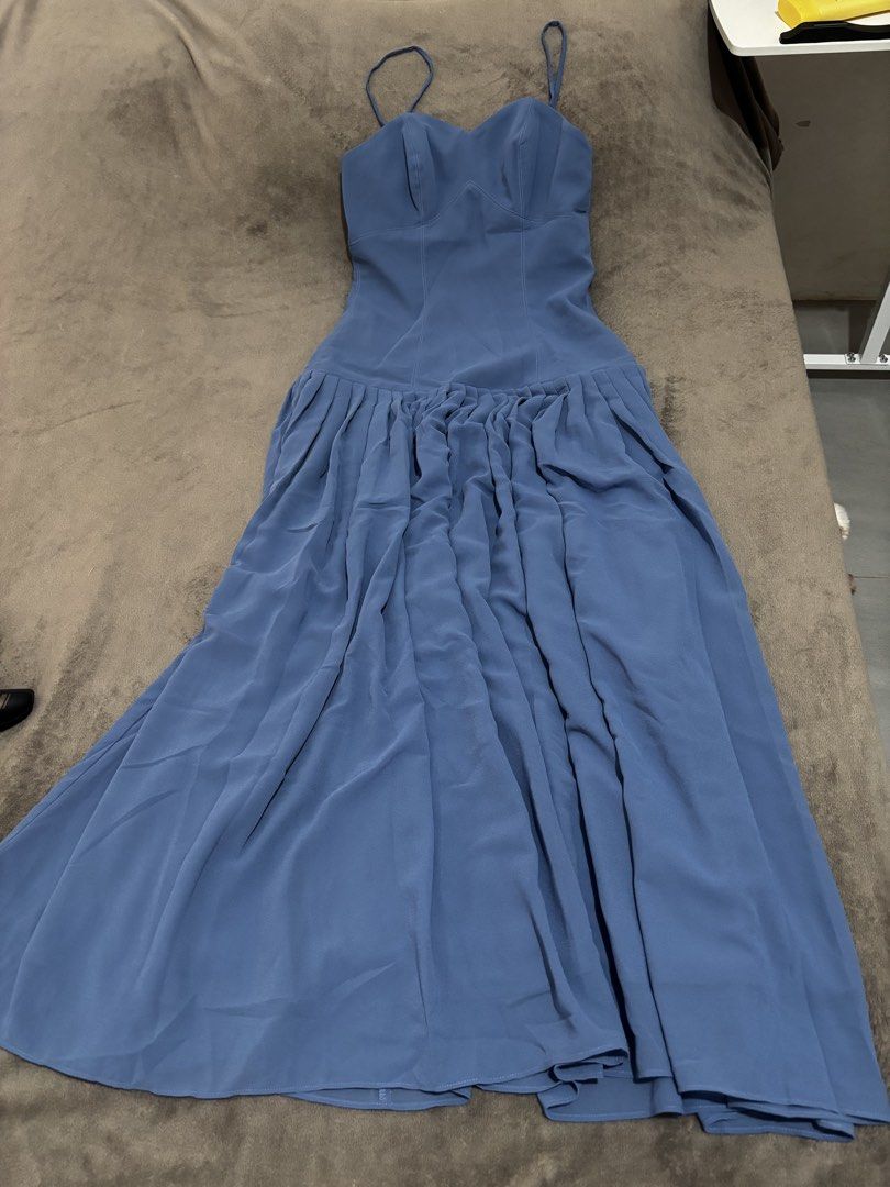 Karimadon Drop Waist Gown (Category: Evening dresses & gowns) located in Pasig City. Submitted by pattycakez (Listing ID 1469971187, Image 3). Description: Bought last year in August for a wedding, but I ended up wearing another dress. Size: extra small Color: dusty blue Original price is 3999 .