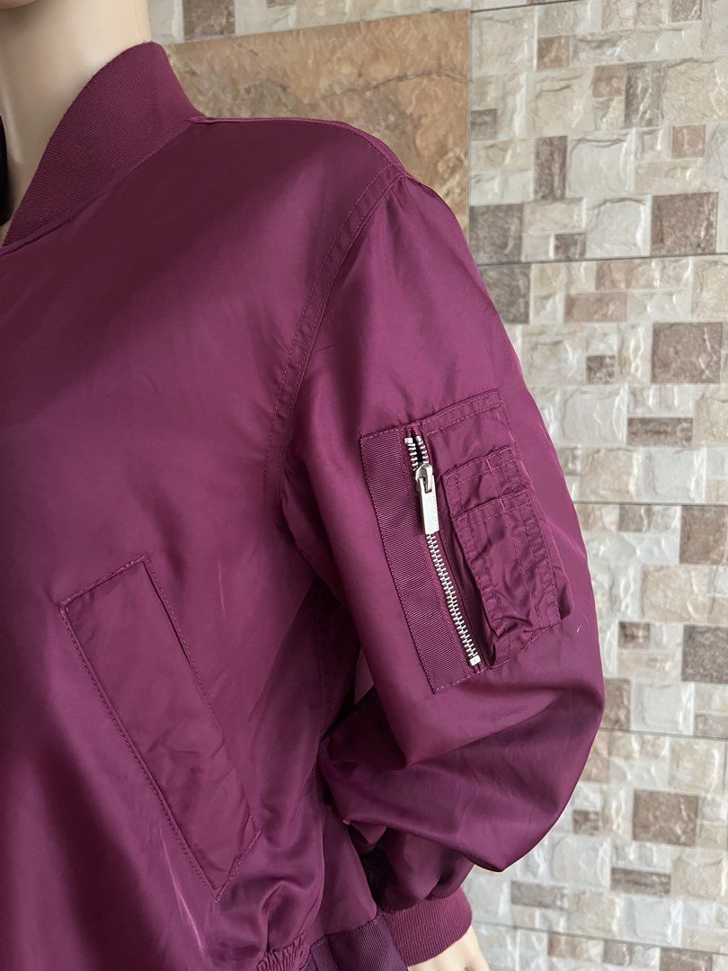 KARL LAGERFIELD MA - 1 BOMBER JACKET (Category: Coats, Jackets and Outerwear) located in Bacolod City. Submitted by timelessbyjosh (Listing ID 1470001858, Image 2). Description: BEST FOR CASUAL & COZY OUTFITS SIZE : 90 ACTUAL COLOR : BURGUNDY COLOR RATE : 9. 5 OUT OF 10 CONDITION : EXCELLENT MATERIAL : 100 % NYLON ( OUTER MATERIAL ) & 98 % POLYESTER & 2 % POLYURETHANE ( COLOR COMBINATION ) & 100 % POLYESTER ( LINING ) MADE IN : FLAWS : NONE DIMEN