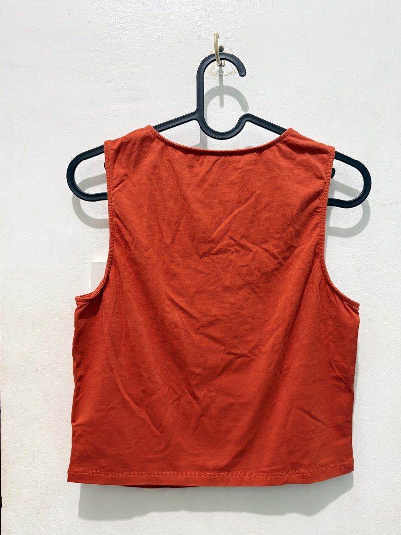 Kashieca Orange Tank Top (Category: Sleeveless) located in Manila. Submitted by katsinlao (Listing ID 1469969376, Image 2). Description: Details: Size: M Color: Orange (hindi siya ganun ka bright orange in person) Payment: - Payment first policy - Gcash - Maya - Gotyme - COD (if lalamove) - Cash if meet up .