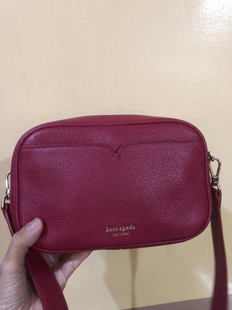 Kate Spade Bag (Category: Cross-body Bags) located in Quezon City. Submitted by attraxion (Listing ID 1470057409, Image 1). Description: Personal bag Used only twice With carecard Wide strap Original Infinite Kate Spade camera bag Color: Pomegranate.