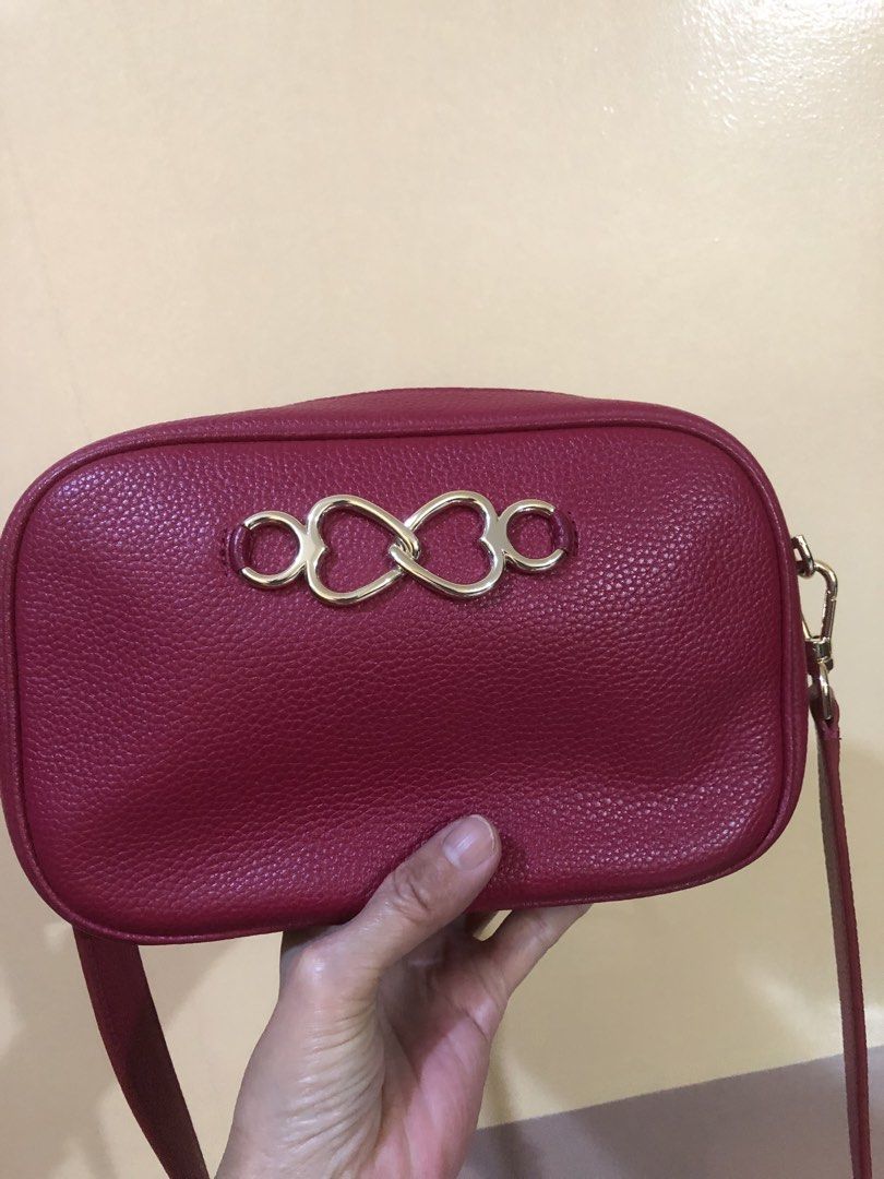 Kate Spade Bag (Category: Cross-body Bags) located in Quezon City. Submitted by attraxion (Listing ID 1470057409, Image 2). Description: Personal bag Used only twice With carecard Wide strap Original Infinite Kate Spade camera bag Color: Pomegranate.