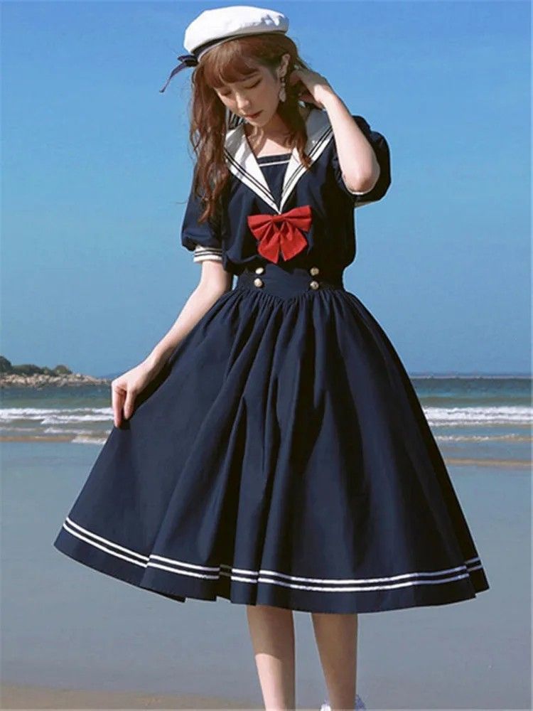 Kawaii Japanese Sailor Bundle 🎀 (Category: Dresses) located in Manila. Submitted by justameowy (Listing ID 1470125989, Image 2). Description: Selling this cute Japanese kawaii clothing bundle! 💗 Perfect for anyone who loves sailor style, coquette, soft girl, and cute Japanese fashion. - 2-piece Japanese sailor dresses and 2 sailor top Bundle includes 4 pieces: 💙 1 Navy blue sailor-style dress with red ribbon 🎀 1 Navy blue dress with sailor co