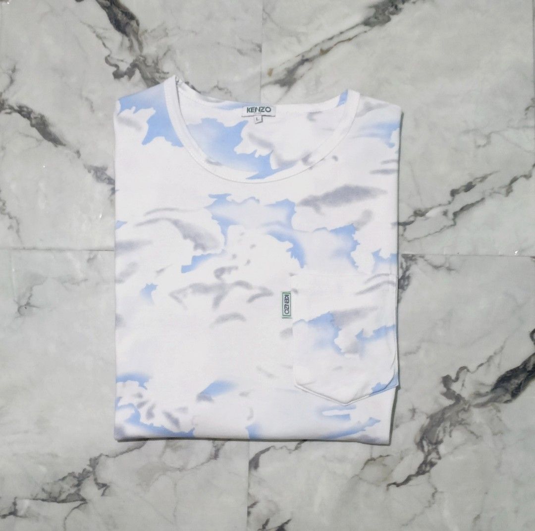 Kenzo Paris Pocket Tee (Category: Luxury Apparel) located in Bacolod City. Submitted by luxtrend.ph (Listing ID 1469952642, Image 2). Description: KENZ0 PARIS P0CKET TEE •Photos may vary due to lighting✨ •For Men •Size: Large on tag •Measurements: 21 W / 28 L •Condition: Excellent •Issues: None •Color Rate: 9.8/10 •Complete tags •₱rice: 1,880🏷 DM to purchase🛒🛒🛒 Courier: J&T Express MOP: Gcash / Bank Transfer PAYMENT FIRST (NO COD) NO RETURN /