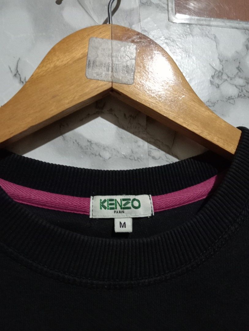 Kenzo Tiger Sweatshirt Black Size M (Category: Coats, Jackets and Outerwear) located in Tarlac. Submitted by luxsourze (Listing ID 1469951919, Image 3). Description: Kenzo Paris Black Tiger Embroidered Logo Sweatshirt Size Medium,Dimes 25L by 20W 💯% Authentic Color Rate: 9.8/10 Excellent Condition Payment First Add sf .