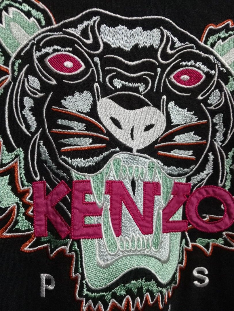 Kenzo Tiger Sweatshirt Black Size M (Category: Coats, Jackets and Outerwear) located in Tarlac. Submitted by luxsourze (Listing ID 1469951919, Image 2). Description: Kenzo Paris Black Tiger Embroidered Logo Sweatshirt Size Medium,Dimes 25L by 20W 💯% Authentic Color Rate: 9.8/10 Excellent Condition Payment First Add sf .