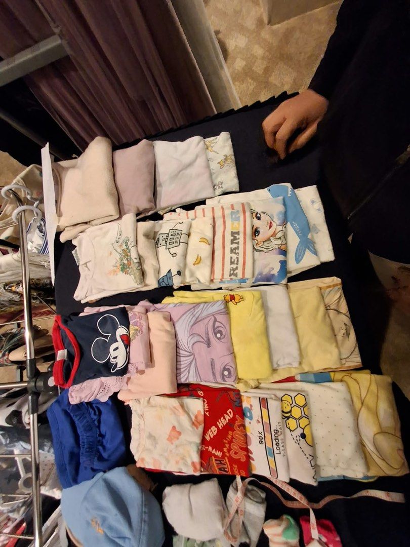 Kids Clothes Bundle Various Designs Tops and Bottoms (Category: Babies & Kids Fashion) located in Makati City. Submitted by rockandraw (Listing ID 1469978278, Image 1). Description: - Big bundle of kids clothes for everyday wear - Includes a mix of shirts, tops, and bottoms - Features popular Disney characters (Mickey Mouse, Frozen), graphic prints, and stripes - Vibrant mix of colors: blue, yellow, red, white, and pink - Neat condition, sold as 