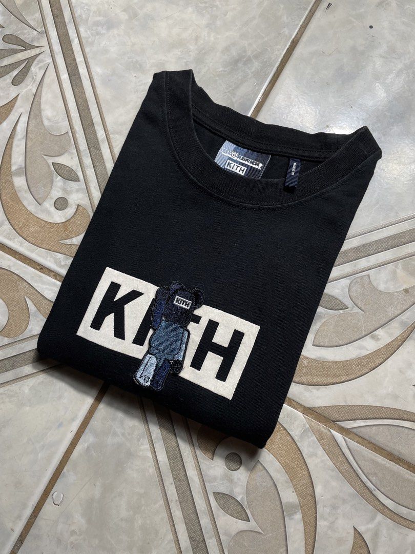 Kith x Bearbrick Logo Tee (Category: Tshirts & Polo Shirts ) located in Quezon City. Submitted by renovare.196 (Listing ID 1470080390, Image 2). Description: Kith x Bearbrick Logo Tee As New Condition Color Rate: 9.8/10 No Issue Measurements • Width: 21 • Length: 27.5 Price: 1500 obo DM IF INTERESTED📥.