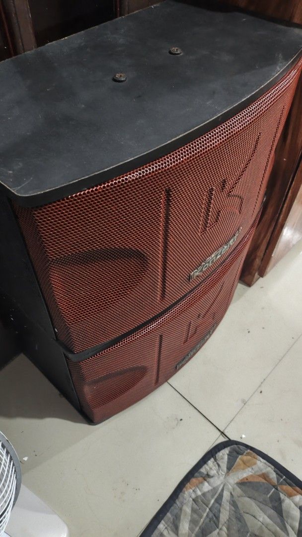 KONZERT KS 450V (Category: Soundbars, Speakers & Amplifiers) located in Caloocan City. Submitted by pinongai (Listing ID 1470094544, Image 1). Description: - Brand/Model: Konzert KS-450V Karaoke Speaker System - Type: 2-way 3-speaker bass reflex - Power: 450 Watts Maximum Power - Impedance: 8 Ohms - Design: Durable build with striking red metal mesh grille and black casing - Condition: Pre-owned, functional, with standard signs of usage - Meetup 