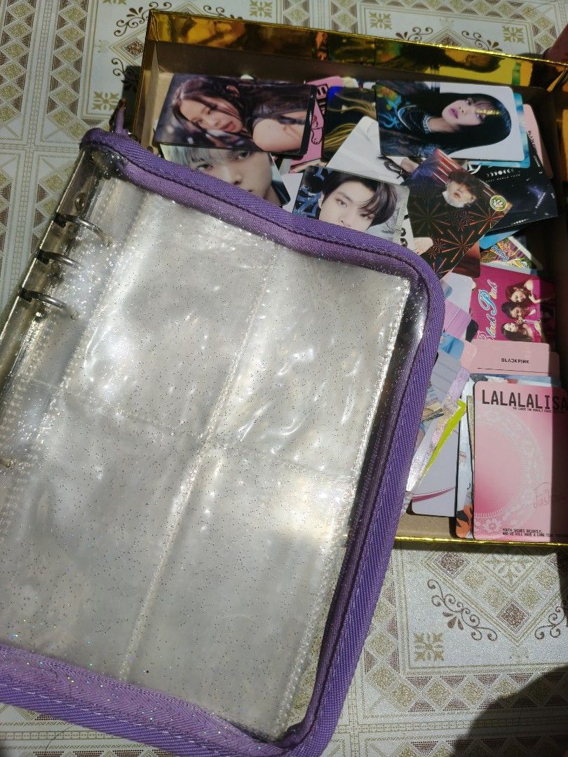 Kpop Photocard Binder Set with Collection (Category: K-Wave Merchandise) located in Quezon City. Submitted by affordable1 (Listing ID 1470049971, Image 1). Description: - Glitter purple binder with a clear cover and secure zipper closure - Holds up to four cards per page for safe storage - Includes a large box filled with various K-pop photocards (Blackpink and more) - Perfect all-in-one set to start or expand your collection as is .