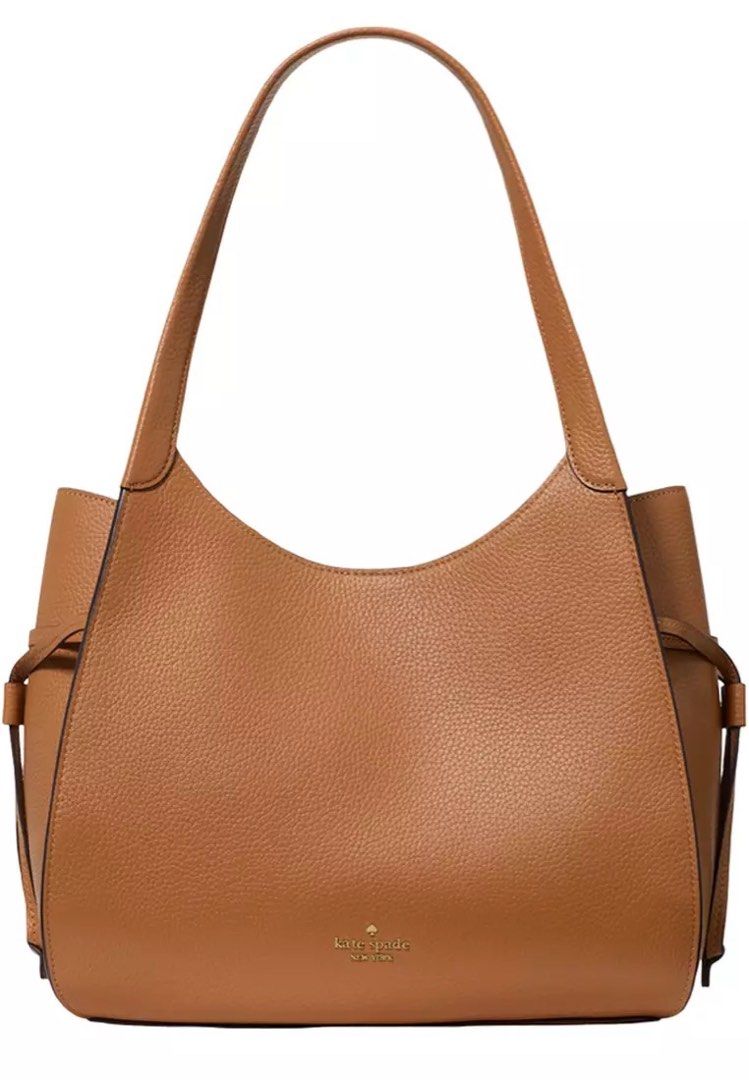 KS Stash (Category: Luxury Bags & Wallets) located in Muntinlupa City. Submitted by mabelleadr46801 (Listing ID 1470005486, Image 2). Description: Fresh drop from Canada 🍁 🇨🇦 Kate Spade Stash Carryall Bag in the Bungalow (brown) colorway. Key Details • Brand: Kate Spade New York • Model: Stash Carryall Bag (KO135) • Material: Pebbled leather / pebbled calf leather • Color: Bungalow (warm tan/brown) • Design Features: Soft slouchy silhouette, d