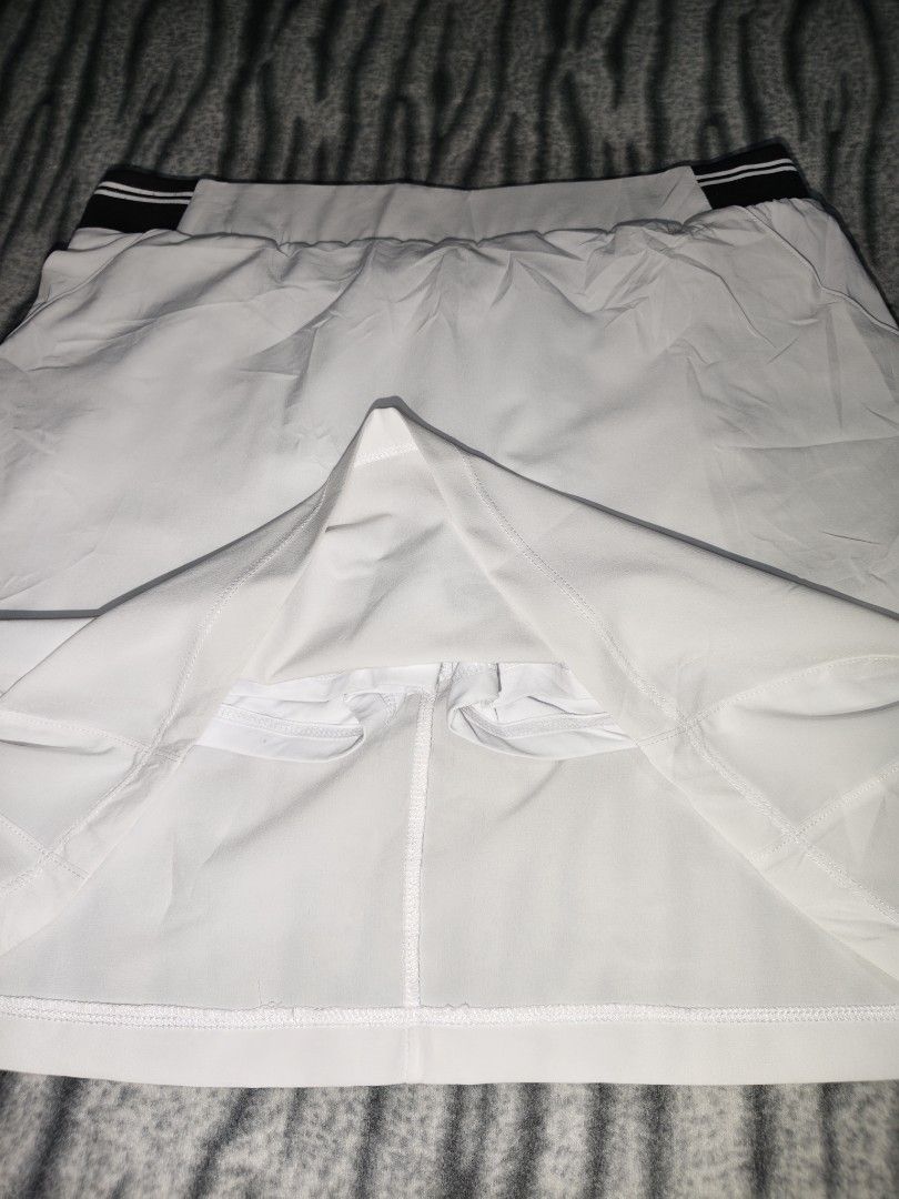 KYG Golf White/Black Golf skirt (Category: Activewear) located in Paranaque City. Submitted by jomcalbrin (Listing ID 1470014017, Image 3). Description: KYG Golf White/Black Golf skirt ‎📍Size M (waist 29 to 34 x 17 inc length) ‎📍Prestine Condition - Gorgeous Simple piece ‎📍Washed/Sanitize-Ready to wear and ship.
