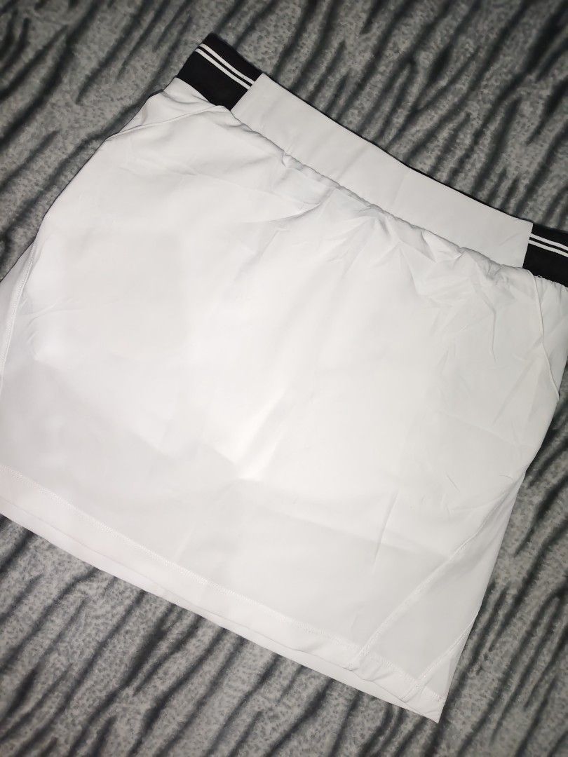 KYG Golf White/Black Golf skirt (Category: Activewear) located in Paranaque City. Submitted by jomcalbrin (Listing ID 1470014017, Image 2). Description: KYG Golf White/Black Golf skirt ‎📍Size M (waist 29 to 34 x 17 inc length) ‎📍Prestine Condition - Gorgeous Simple piece ‎📍Washed/Sanitize-Ready to wear and ship.