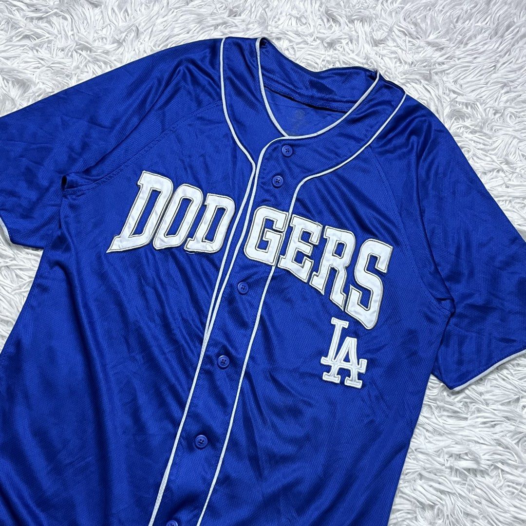 La Dodgers MLB jersey (Category: Activewear) located in Baguio. Submitted by sellingtonshop (Listing ID 1469949622, Image 2). Description: u4. Los Angeles Dodgers Baseball Jersey by True Fan Size: S mens or M womens Dimes: 26*19 Condition: excellent Issue: none Mine: 780 Steal: 880 Grab: 980.