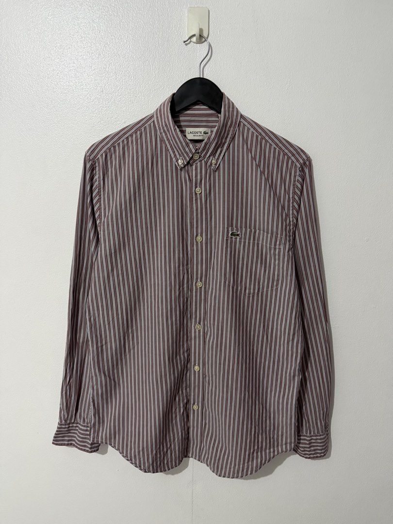 Lacoste - Button Down Long Sleeve Polo - Vertical Stripe (Category: Formal Shirts) located in Caloocan City. Submitted by thriftingbanana (Listing ID 1470081663, Image 1). Description: Excellent No issue Small Width 19 inches Length 28 inches.