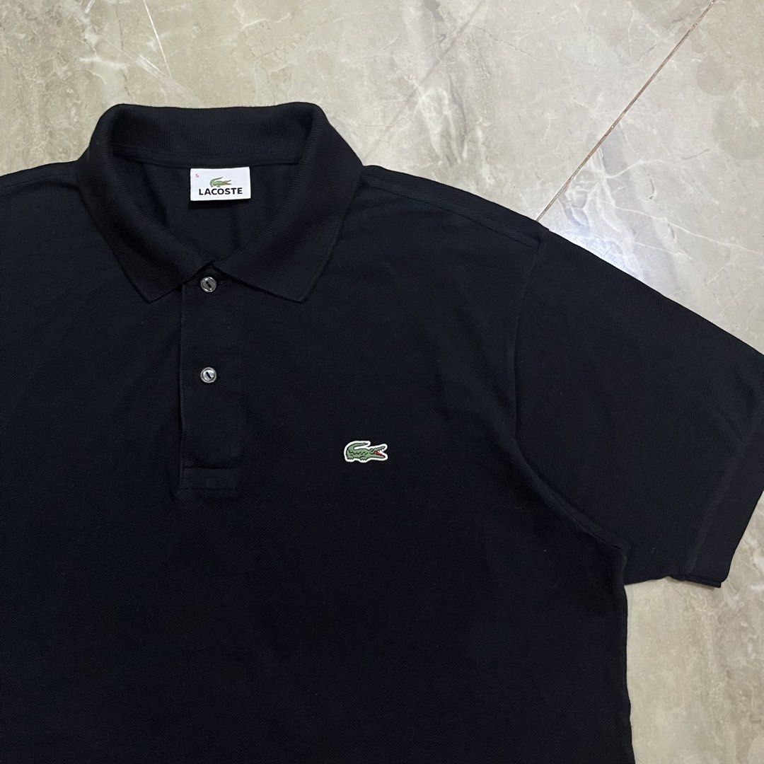 LACOSTE BLACK POLO SHIRT (Category: Luxury Apparel) located in Marikina City. Submitted by arniejane23 (Listing ID 1470030479, Image 2). Description: LACOSTE BLACK POLO SHIRT SIZE 5 on tag DIMENSION width - 22.5 to 23 inches length - 27 COLOR RATE 10/10 NO ISSUE/NO FLAWS/NO FADING/NO NECK DISCOLORATION/ NO LINTS/NO PINHOLES EXCELLENT ASNEW CONDITION!!.