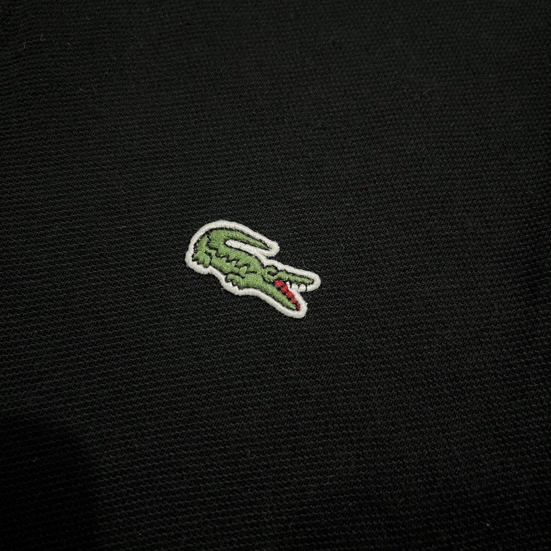 LACOSTE BLACK POLO SHIRT (Category: Luxury Apparel) located in Marikina City. Submitted by arniejane23 (Listing ID 1470030479, Image 3). Description: LACOSTE BLACK POLO SHIRT SIZE 5 on tag DIMENSION width - 22.5 to 23 inches length - 27 COLOR RATE 10/10 NO ISSUE/NO FLAWS/NO FADING/NO NECK DISCOLORATION/ NO LINTS/NO PINHOLES EXCELLENT ASNEW CONDITION!!.