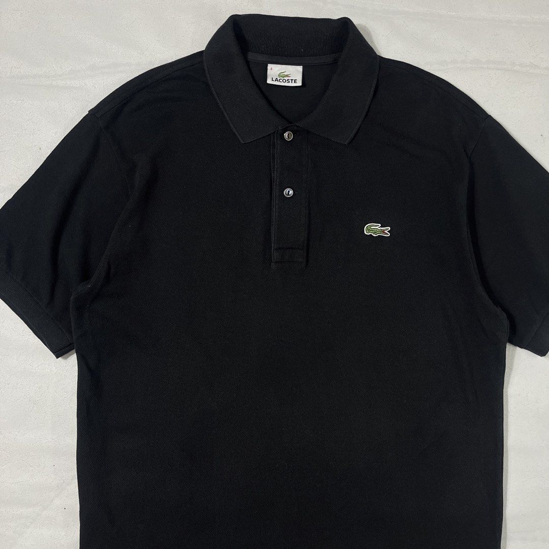 Lacoste Black Poloshirt (Category: Tshirts & Polo Shirts ) located in Nasugbu. Submitted by janstuffs.ph (Listing ID 1470120502, Image 2). Description: Lacoste Black Poloshirt 💯Legit! Size: 4/Medium Width: 20" Length: 28" Condition: 9.5/10 Excellent Flaw: NONE Mine: 1380 •Buyer shoulder shipping fee - ship via j&t. •Read details before purchasing..