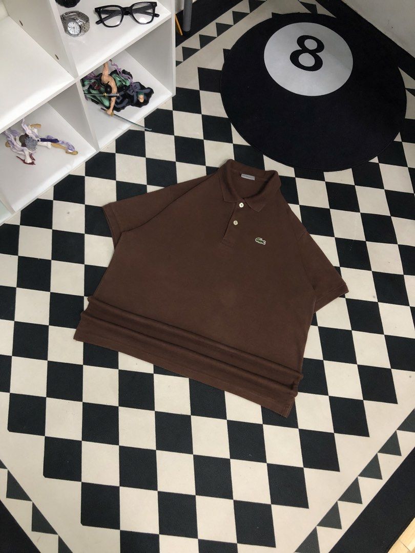 Lacoste Brown Polo Shirt Size 5 (Category: Tshirts & Polo Shirts ) located in Manila. Submitted by ejaay_2012 (Listing ID 1470104501, Image 1). Description: - Brand: Lacoste - Color: Brown - Size: 5 - Style: Short sleeves, standard collar with 2 buttons - Details: Classic green crocodile logo on the chest - Care: Machine wash cold - Condition: Clean and ready to wear.