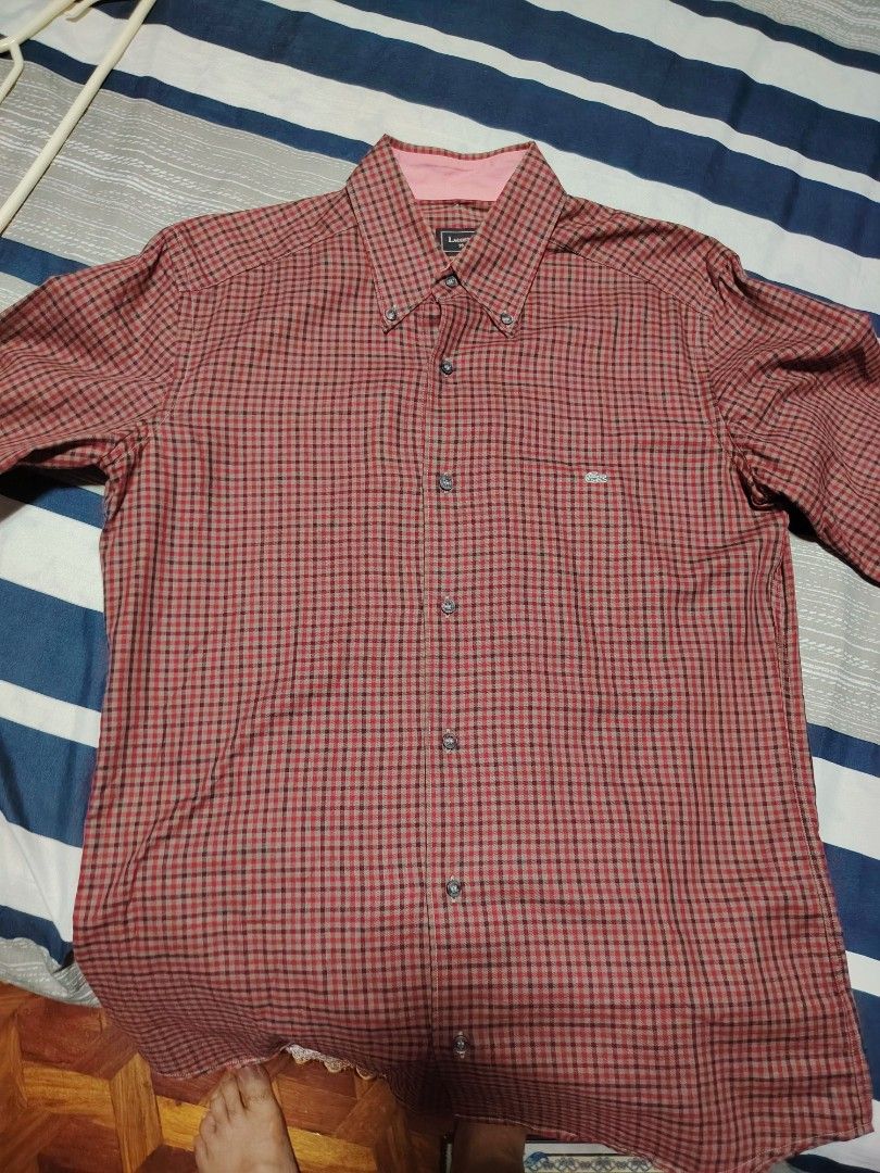Lacoste Checkered Long Sleeve Button-Down Shirt (Category: Formal Shirts) located in Manila. Submitted by snooks1938 (Listing ID 1470115013, Image 1). Description: Up For Sale.. Men's LACOSTE Long Sleeves - Brand: Lacoste - Size: (39 XS or Small) - Pattern: Red and black checkered all over - Details: Button-down collar with contrast pink inner lining - Pocket: Front chest pocket with signature embroidered crocodile logo - Closure: Standard front 