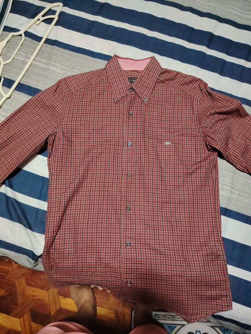 Lacoste Checkered Long Sleeve Button-Down Shirt (Category: Formal Shirts) located in Manila. Submitted by snooks1938 (Listing ID 1470115013, Image 3). Description: Up For Sale.. Men's LACOSTE Long Sleeves - Brand: Lacoste - Size: (39 XS or Small) - Pattern: Red and black checkered all over - Details: Button-down collar with contrast pink inner lining - Pocket: Front chest pocket with signature embroidered crocodile logo - Closure: Standard front 