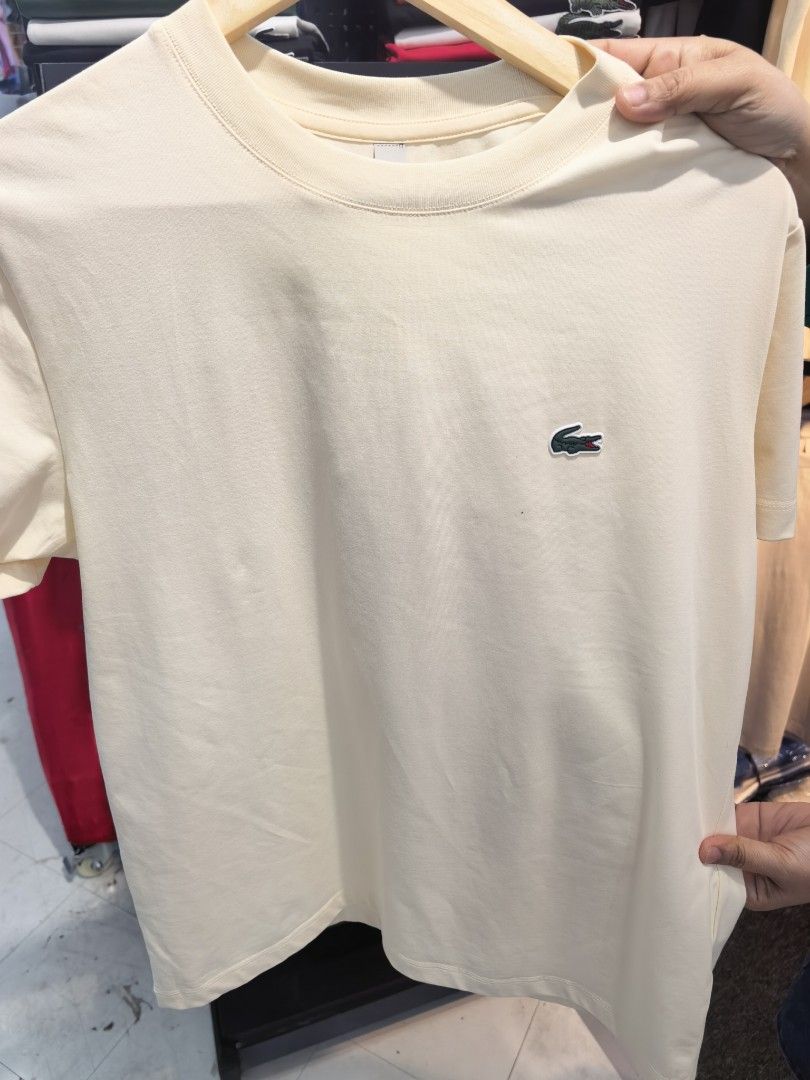 Lacoste Crew Neck T-Shirt Multiple Colors Available Size M (Category: Tshirts & Polo Shirts ) located in Las Pinas. Submitted by teampeewee888 (Listing ID 1470022939, Image 1). Description: - Style: Classic crew neck t-shirt with a clean finish - Detail: Signature embroidered crocodile patch on the chest - Fit: Classic fit with short sleeves and straight hem - Material: Breathable, high-quality cotton for daily comfort - Size: Tagged Size small t