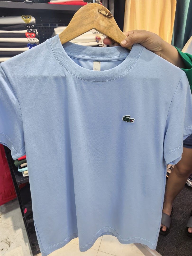Lacoste Crew Neck T-Shirt Multiple Colors Available Size M (Category: Tshirts & Polo Shirts ) located in Las Pinas. Submitted by teampeewee888 (Listing ID 1470022939, Image 3). Description: - Style: Classic crew neck t-shirt with a clean finish - Detail: Signature embroidered crocodile patch on the chest - Fit: Classic fit with short sleeves and straight hem - Material: Breathable, high-quality cotton for daily comfort - Size: Tagged Size small t
