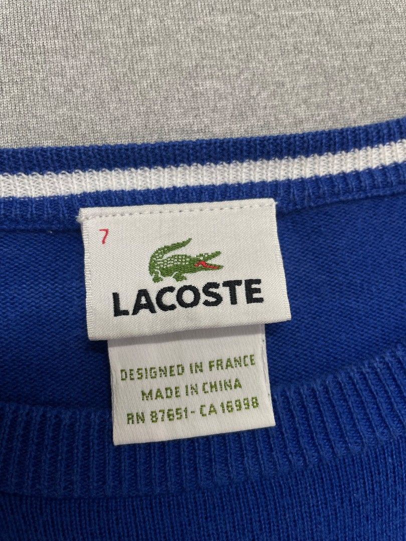 Lacoste Knit Sweater (Category: Coats, Jackets and Outerwear) located in Manila. Submitted by _retrovate (Listing ID 1469992205, Image 3). Description: Size 7 Fits Large Excellent condition.