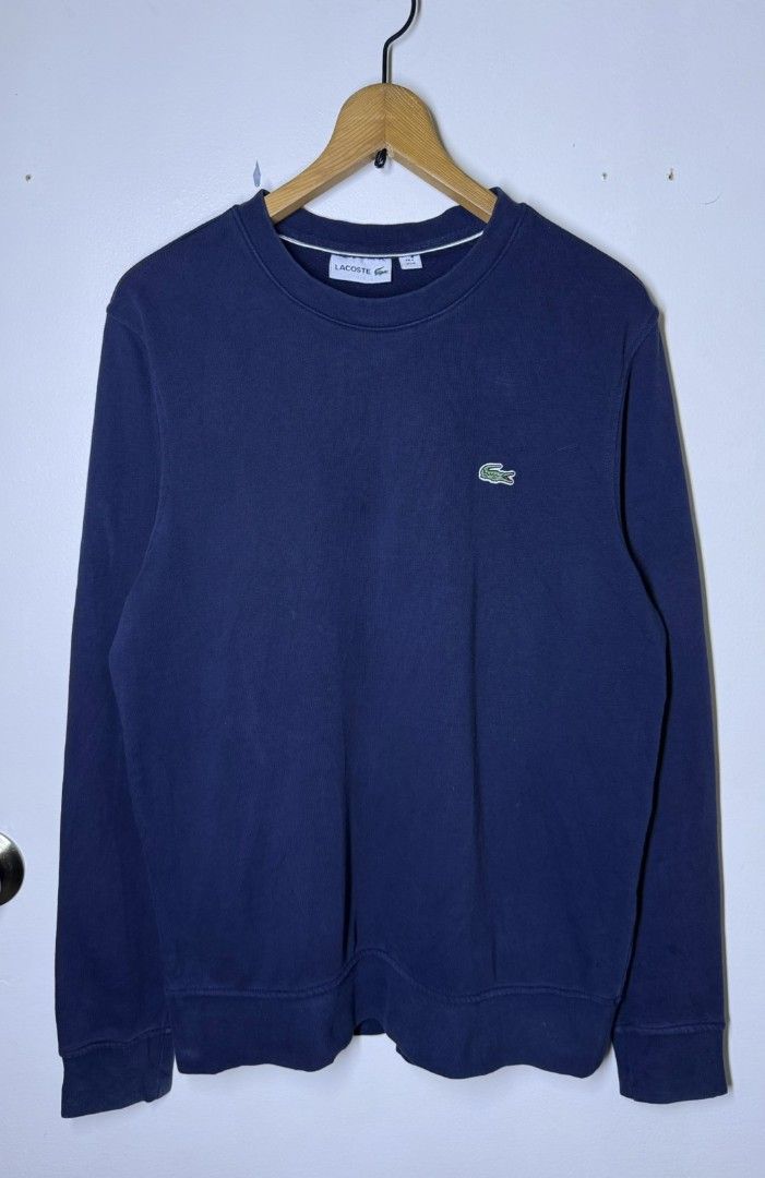 LACOSTE NAVY BLUE SWEATER (Category: Coats, Jackets and Outerwear) located in Manila. Submitted by lunaras_declutter (Listing ID 1470107516, Image 2). Description: MEDIUM LIKE NEW.