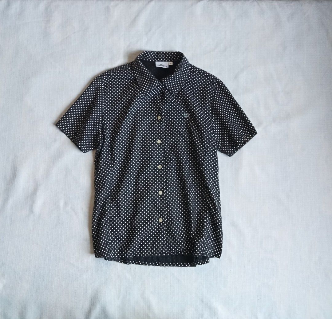 Lacoste polka dots buttondown shortsleeve polo (Category: Shirts) located in Bagabag. Submitted by thrift_stories96 (Listing ID 1470125708, Image 1). Description: Lacoste polka dots buttondown shortsleeve polo Size 38 - medium womens Length - 23 Width - 18 Condition - excellent No flaw.