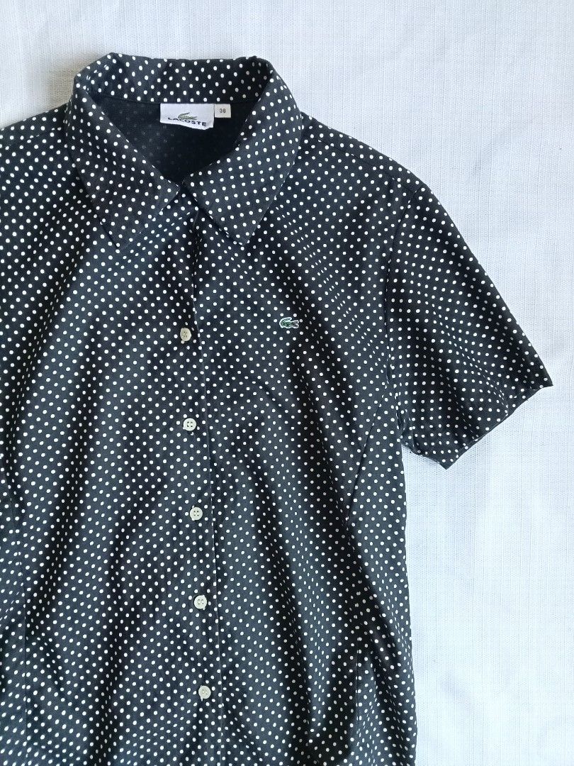 Lacoste polka dots buttondown shortsleeve polo (Category: Shirts) located in Bagabag. Submitted by thrift_stories96 (Listing ID 1470125708, Image 2). Description: Lacoste polka dots buttondown shortsleeve polo Size 38 - medium womens Length - 23 Width - 18 Condition - excellent No flaw.