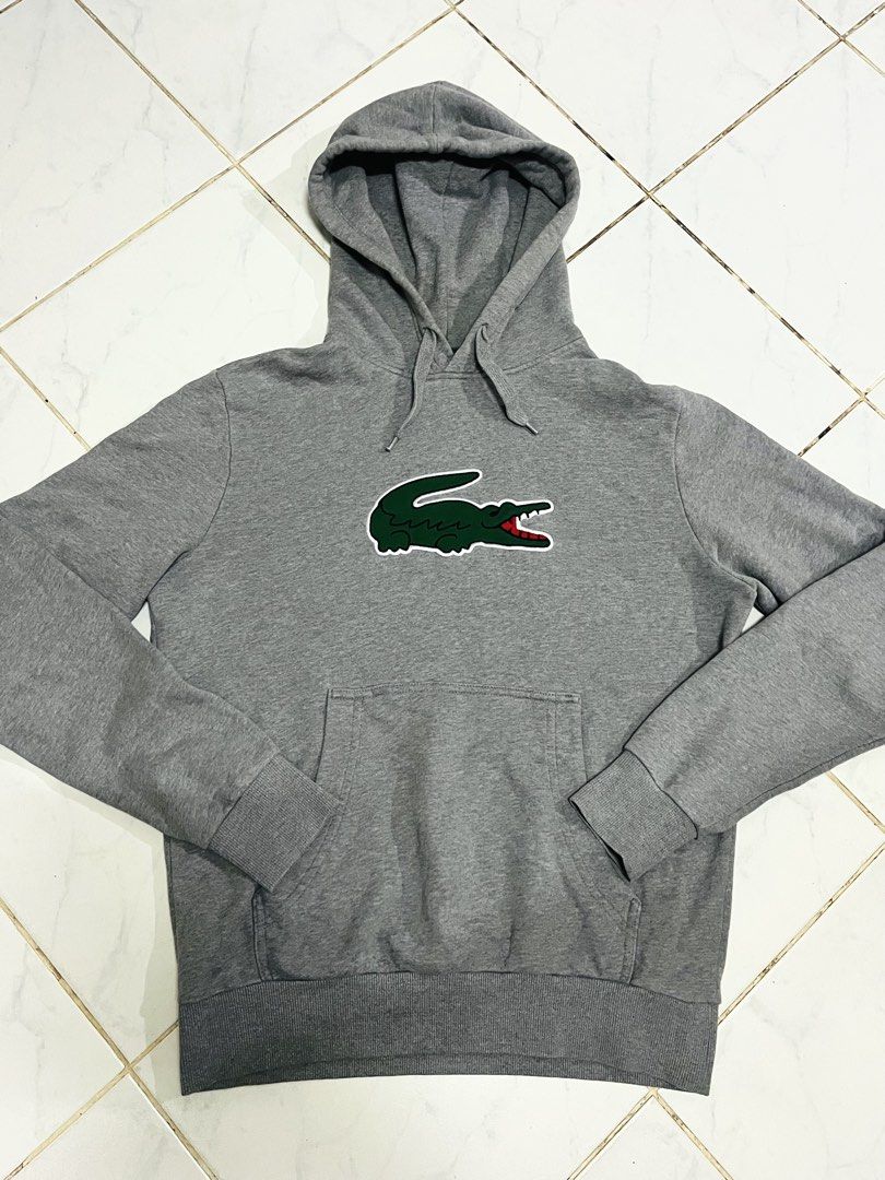 lacoste pullover hooded jacket biglogo (Category: Luxury Apparel) located in Muntinlupa City. Submitted by buymothriftko (Listing ID 1470136890, Image 1). Description: lacoste biglogo pullover hooded jacket size:3 medium fits 21x26 authentic in xcellent condtion 2999 only.