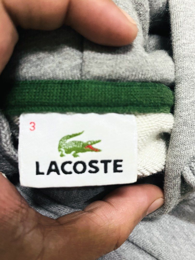 lacoste pullover hooded jacket biglogo (Category: Luxury Apparel) located in Muntinlupa City. Submitted by buymothriftko (Listing ID 1470136890, Image 3). Description: lacoste biglogo pullover hooded jacket size:3 medium fits 21x26 authentic in xcellent condtion 2999 only.