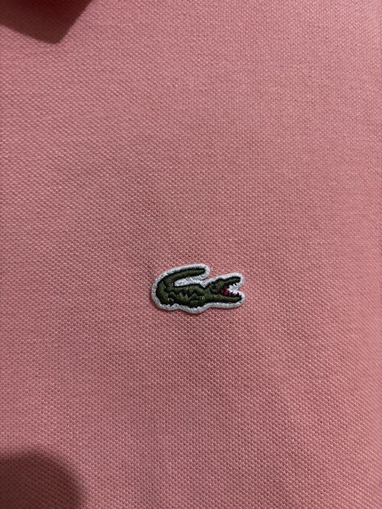 Lacoste Salmon Pink (Category: Tshirts & Polo Shirts ) located in Muntinlupa City. Submitted by owrayttttt (Listing ID 1470100714, Image 2). Description: - Lacoste Salmon Pink - Complete tags - Size 4 on tag - Dimes is 21x26 perfect for medium size - Needs to be washed - Free shipping via j&t.