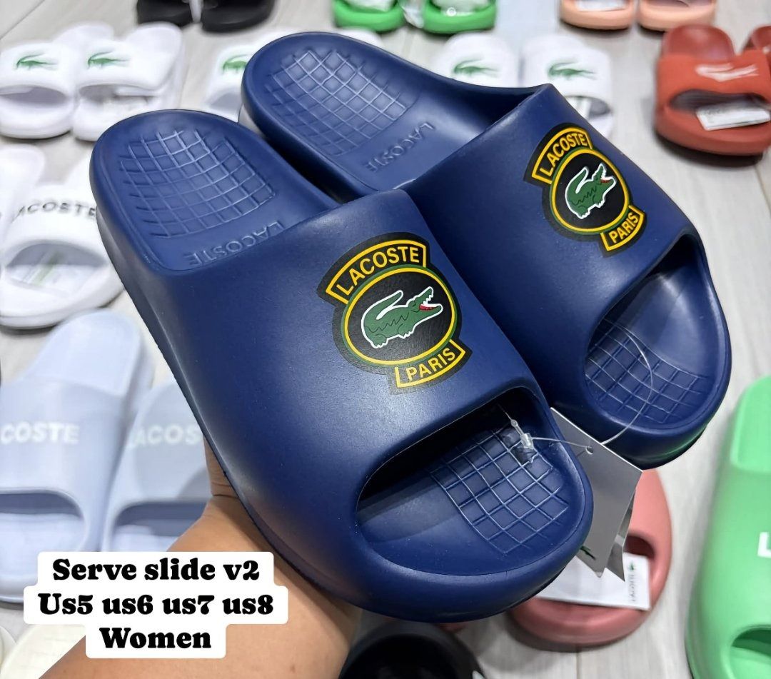 Lacoste Serve Slide V2 - Dark Blue (Category: Slippers and slides) located in Rizal. Submitted by hiraya16 (Listing ID 1470008609, Image 1). Description: Womens Size posted available Onhand ready to ship.